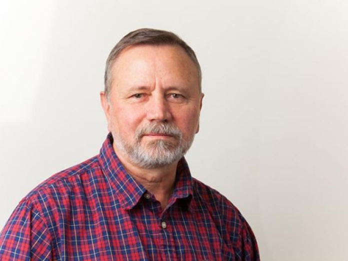 Headshot of a man indoors